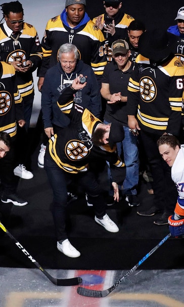 Bergeron scores 2 in milestone game, Bruins top Isles 3-1